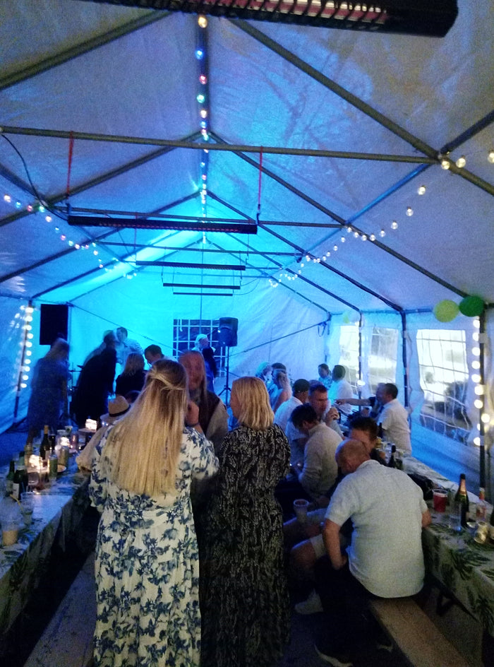 Partytelt til 50-årslag med dekket langbord